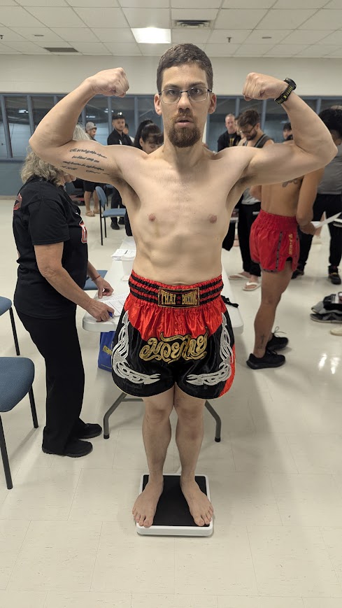 Matt Knepp representing CPAMMA at a Muay Thai weigh-in