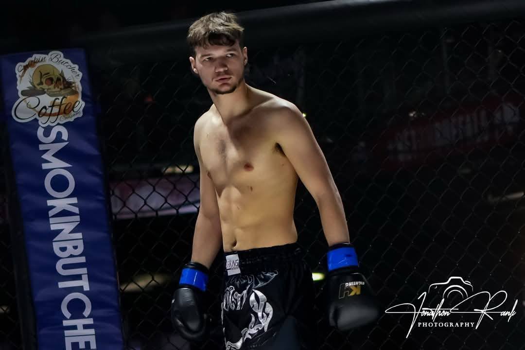Bodhi Kennedy preparing to compete in the MMA cage