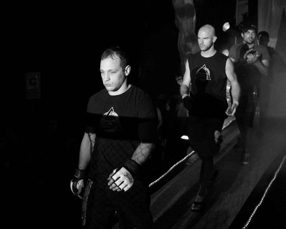 Richard Brooks leading the CPAMMA fight team during a walkout